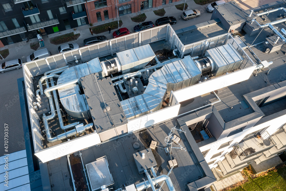 Ventilation and air conditioning system on the roof of the house. View from above
